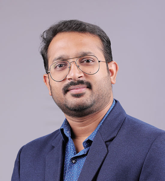 Dr. Adil K T